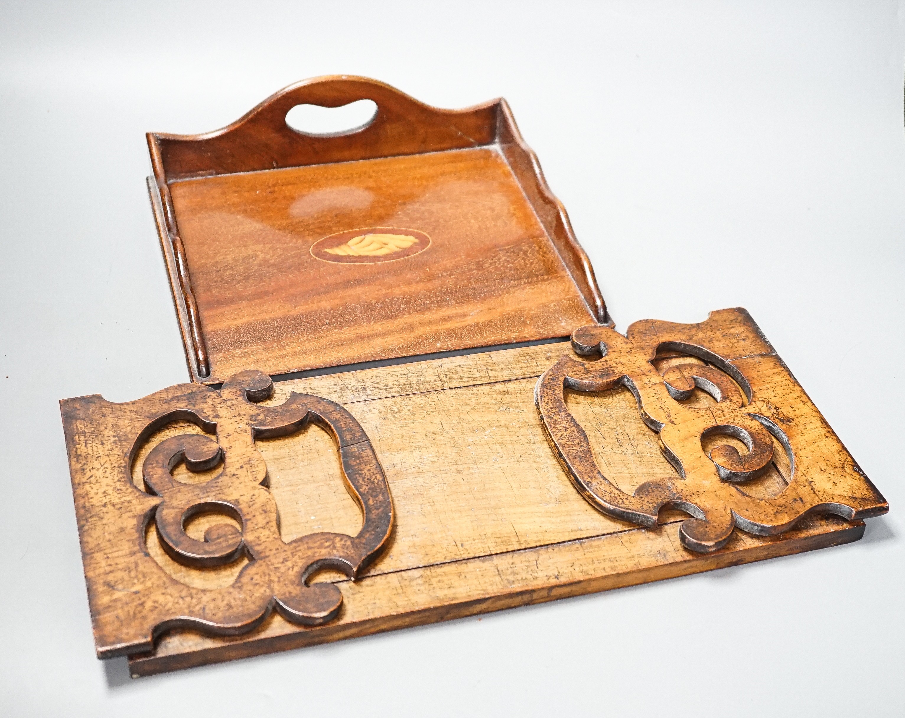 A Victorian walnufolding bookslide and an inlaid mahogany tray, largest 40cms wide.